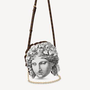 POCHETTE TETE handbags